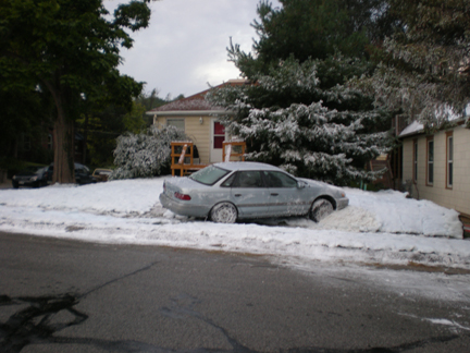 car  crashes into snow bank with fake snow blankets