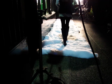 model walking  on snow  blankets